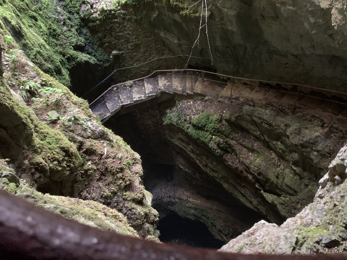 There were no stairs when the first explorer was lowered down this massive cave mouth on ropes.. then dropped..