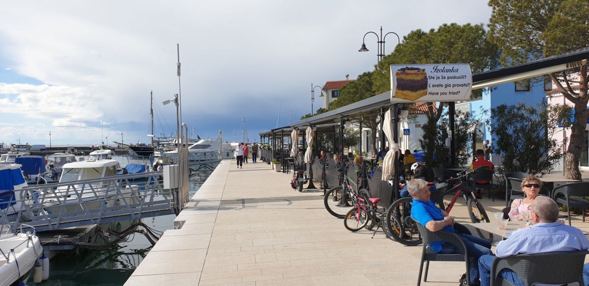 the main promenade is lined with cafes, restaurants and a rather good ice cream shop.. the main promenade is lined with cafes, restaurants and a rather good ice cream shop..