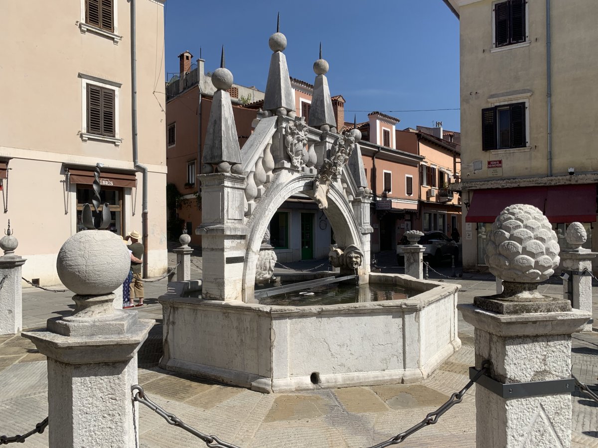 Lovely fountain near the old town gate..