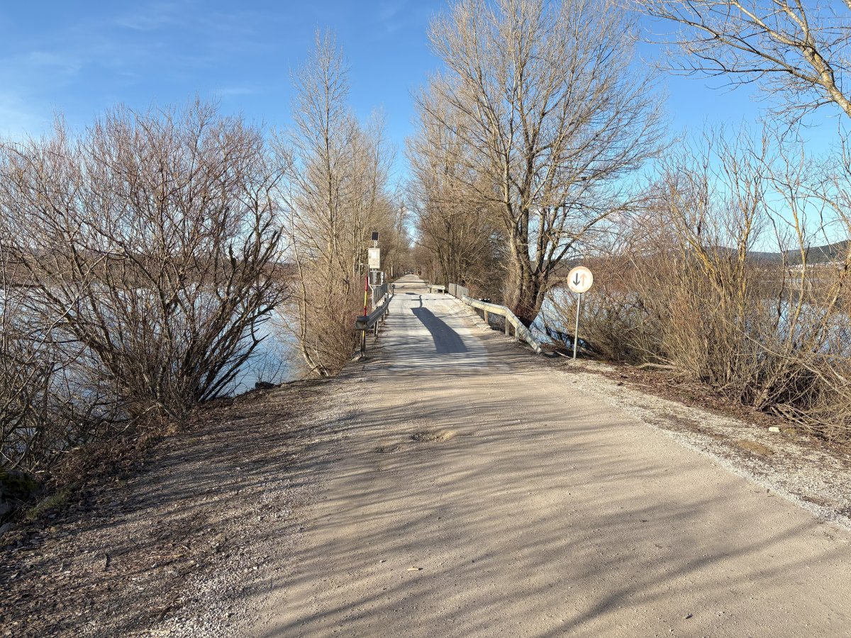 on the other side of the first bridge.. you can see the water on both sides..