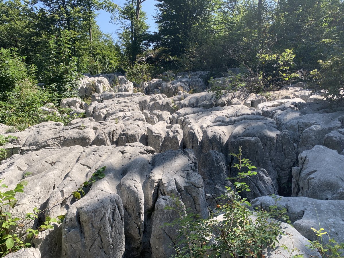 This huge limesone formation on the way to the Okno is known as KARREN and is a protected national Slovenian monument.. This huge limesone formation on the way to the Okno is known as KARREN and is a protected national Slovenian monument..
