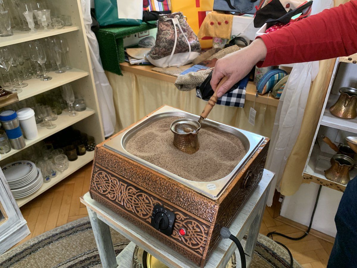 Turkish style coffee on the go in the hot sand.. Turkish style coffee on the go in the hot sand..