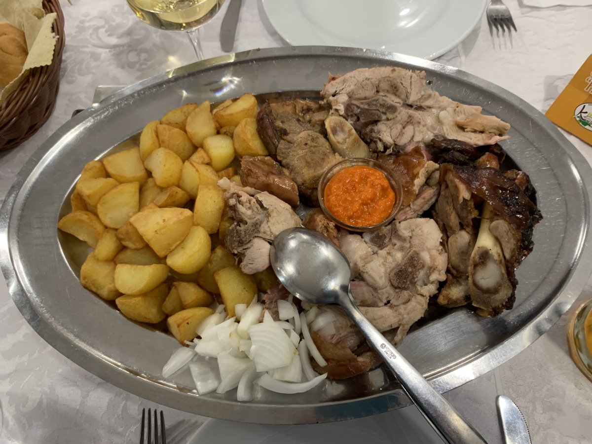 sensational hog roast dinner with raw onion and avjar.. Slovenian cavjar..