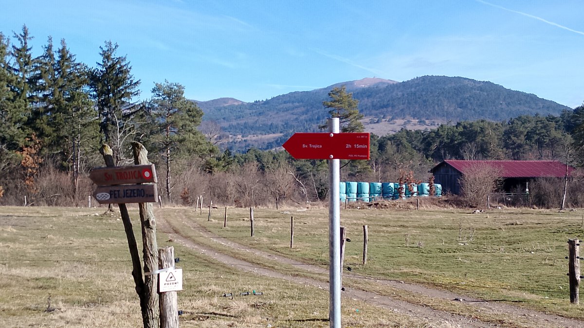 You can just see Sv Troica church on top of the mountain almost directly above the red sign.. You can just see Sv Troica church on top of the mountain almost directly above the red sign..