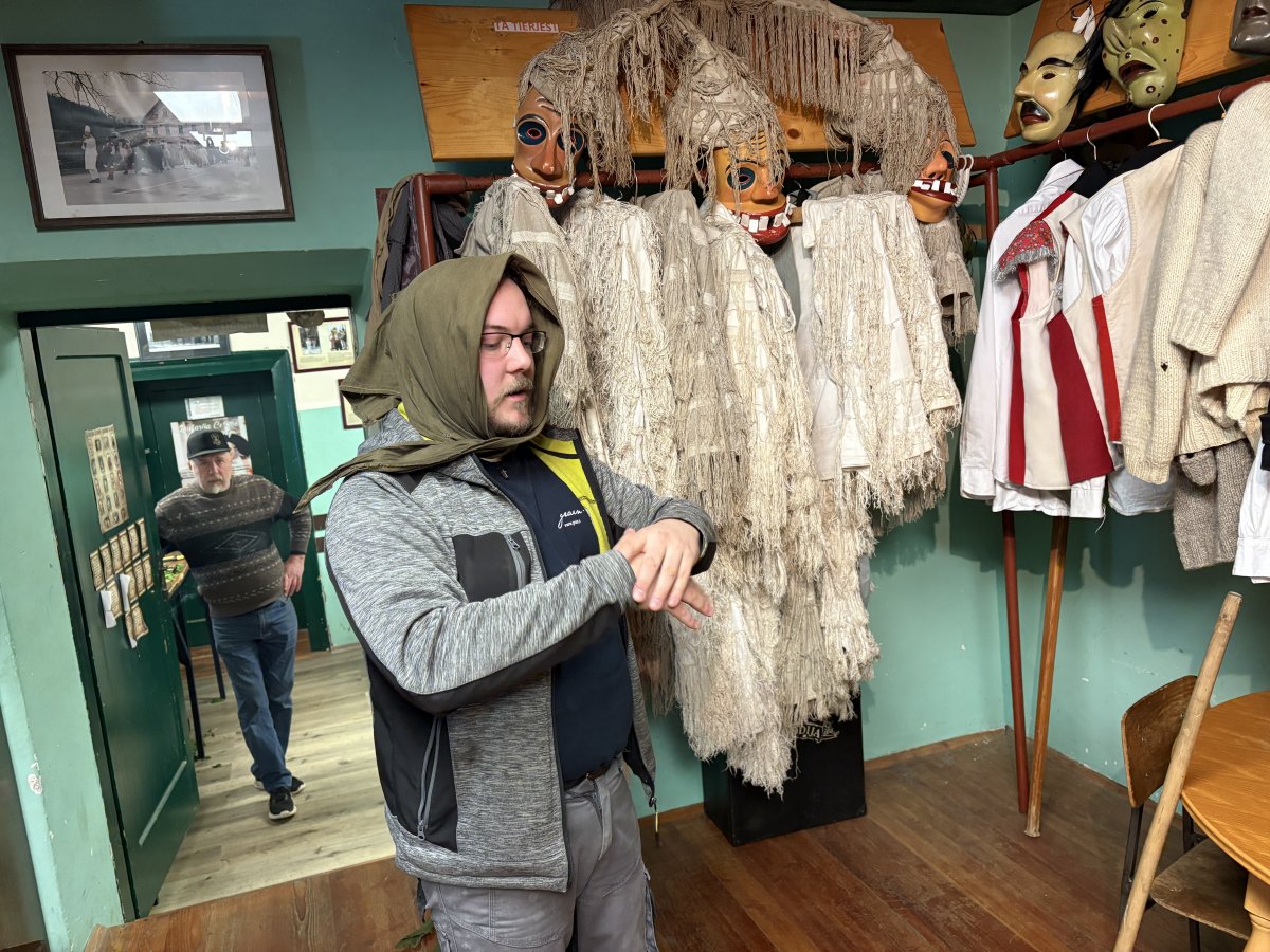 Miha and Toni were amazing hosts and here Miha explains how each player wears a cloth shawl under the mask to help conceal their identity.. Miha and Toni were amazing hosts and here Miha explains how each player wears a cloth shawl under the mask to help conceal their identity..