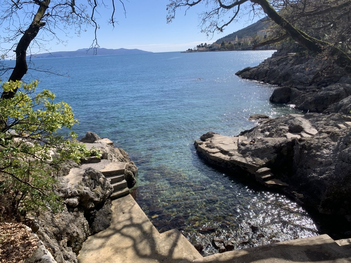 Numerous little stone beaches along the low cliffs of the Lungomare coastal walk in Opatija.. Numerous little stone beaches along the low cliffs of the Lungomare coastal walk in Opatija..