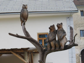 wooden bears at predjama castle